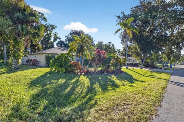 a view of a swimming pool with a garden