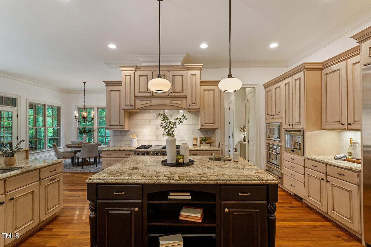 11321 Royal Amber Way Raleigh, NC 27614 - Photo 10 of 46 Gourmet Kitchen with Viking and Thermador Appliances; Pot Filler, Pre Sink, Butler's Pantry with Wine Refrigerator and Ice Maker