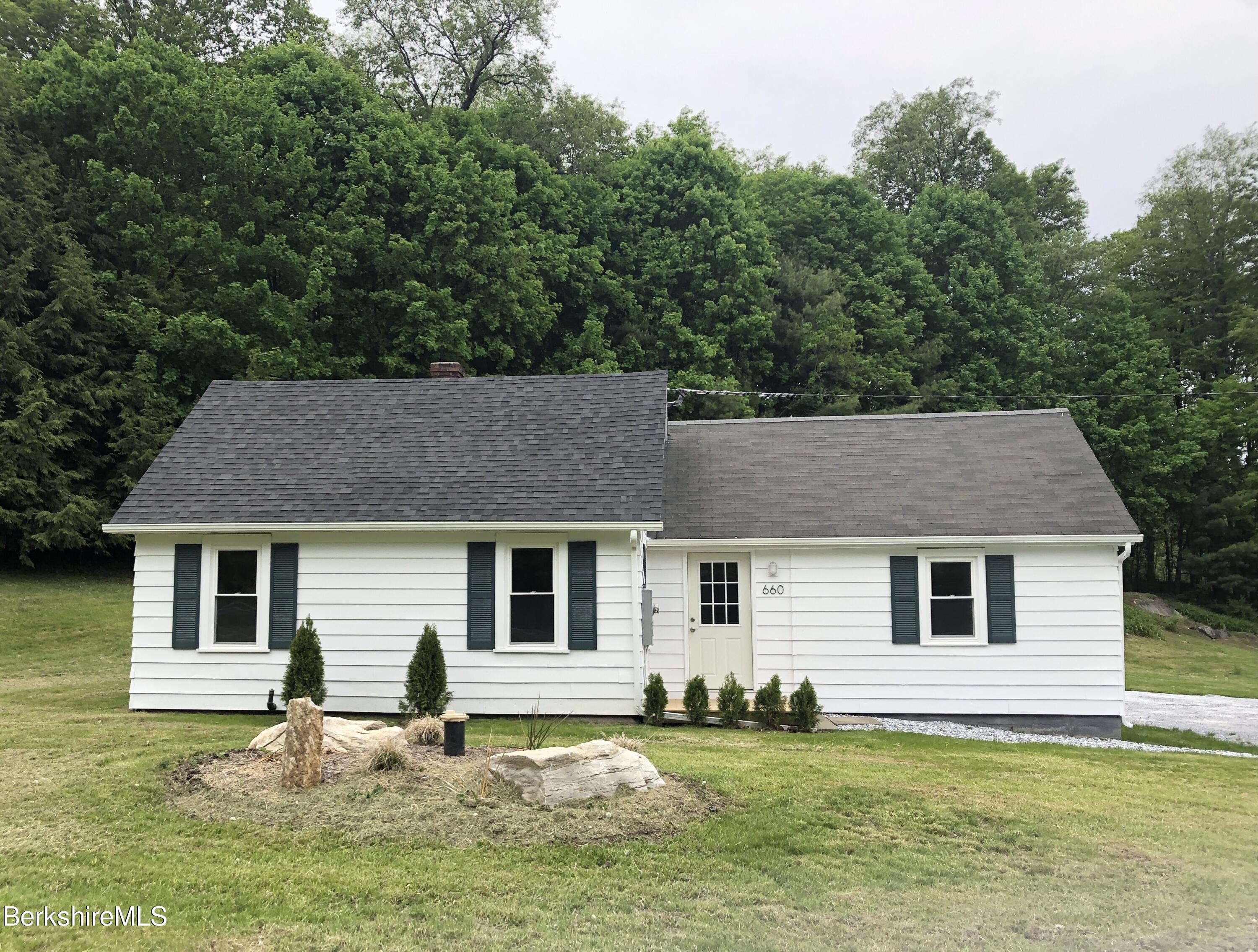 660 State Road Richmond, MA 01254 - Photo 3 of 15 a house that has tree in front of it