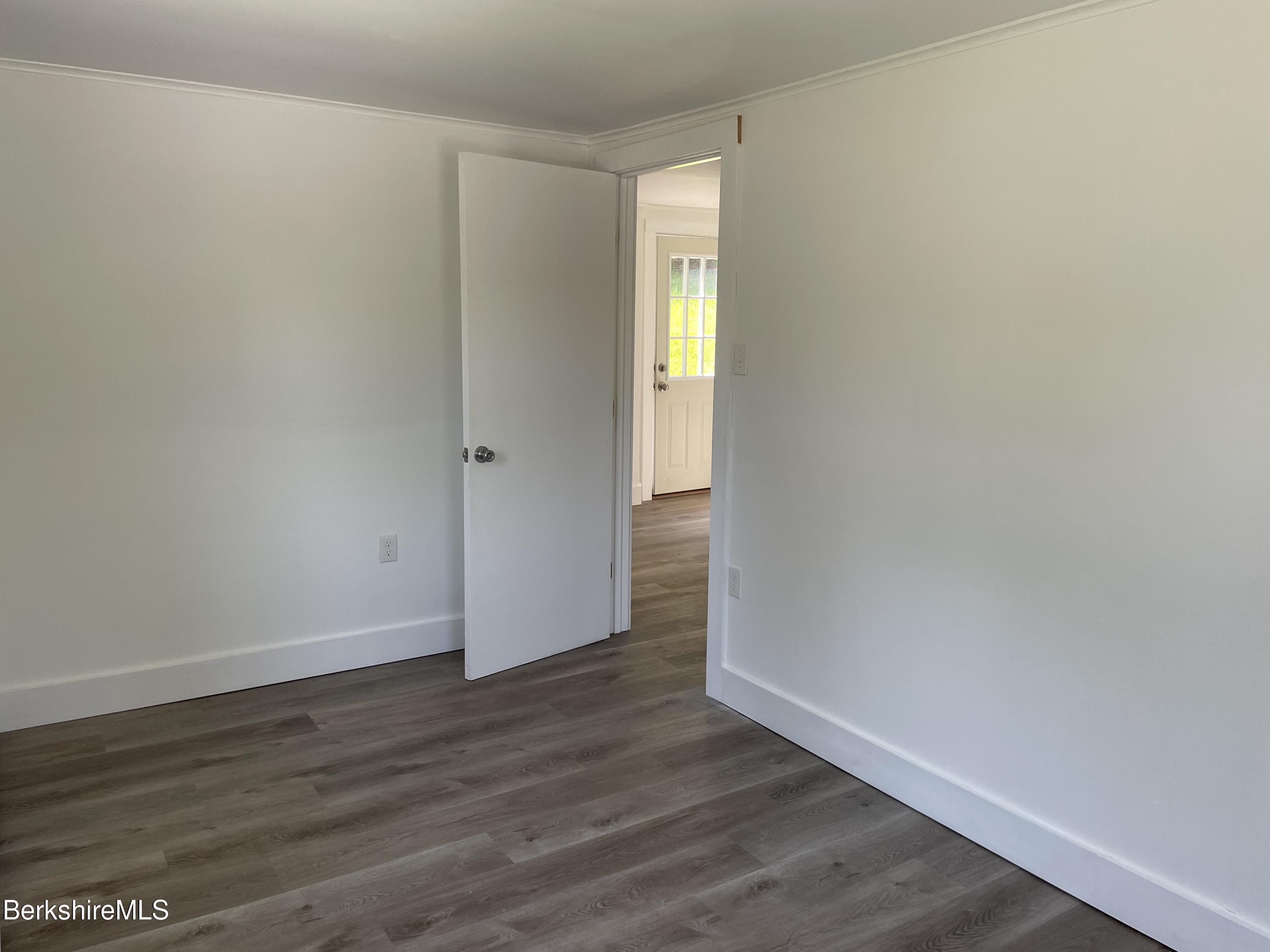 660 State Road Richmond, MA 01254 - Photo 6 of 15 a view of an empty room with wooden floor