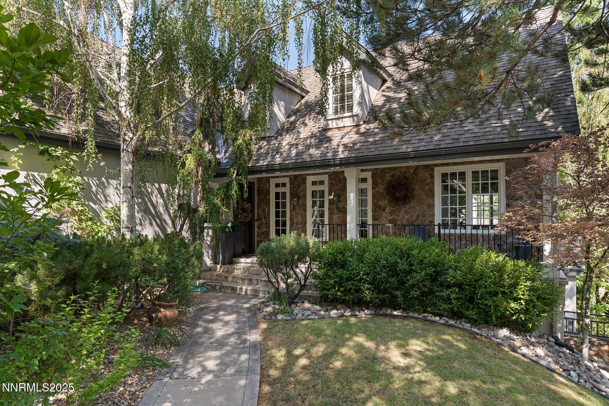 front view of house with a small yard