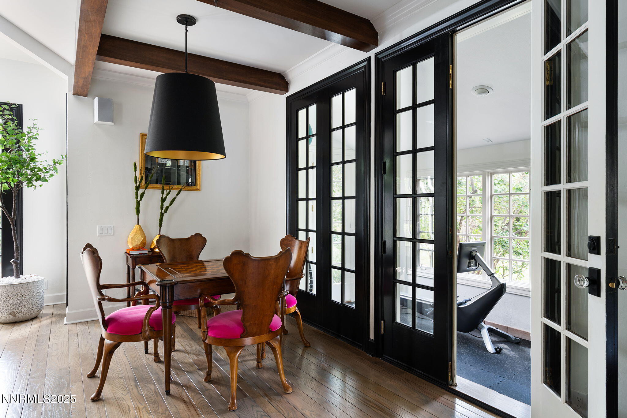 144 Greenridge Drive Reno, NV 89509 - Photo 16 of 71 a view of a dining room with furniture window and wooden floor