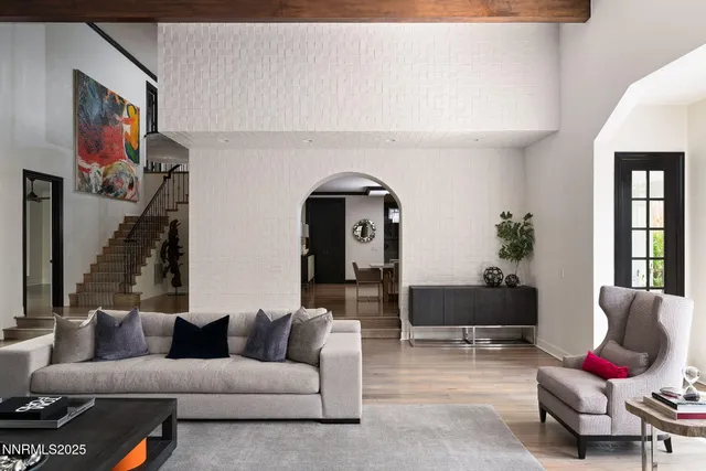 a kitchen with granite countertop a sink stainless steel appliances a counter top space and cabinets