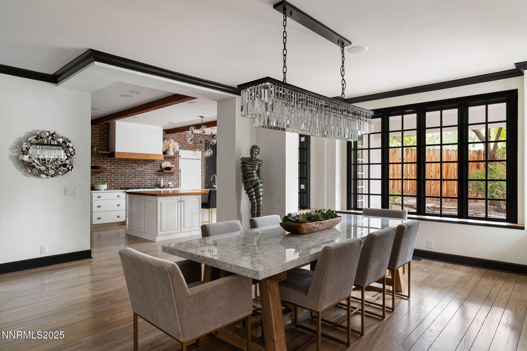 144 Greenridge Drive Reno, NV 89509 - Photo 19 of 71 a view of a dining room with furniture window and wooden floor