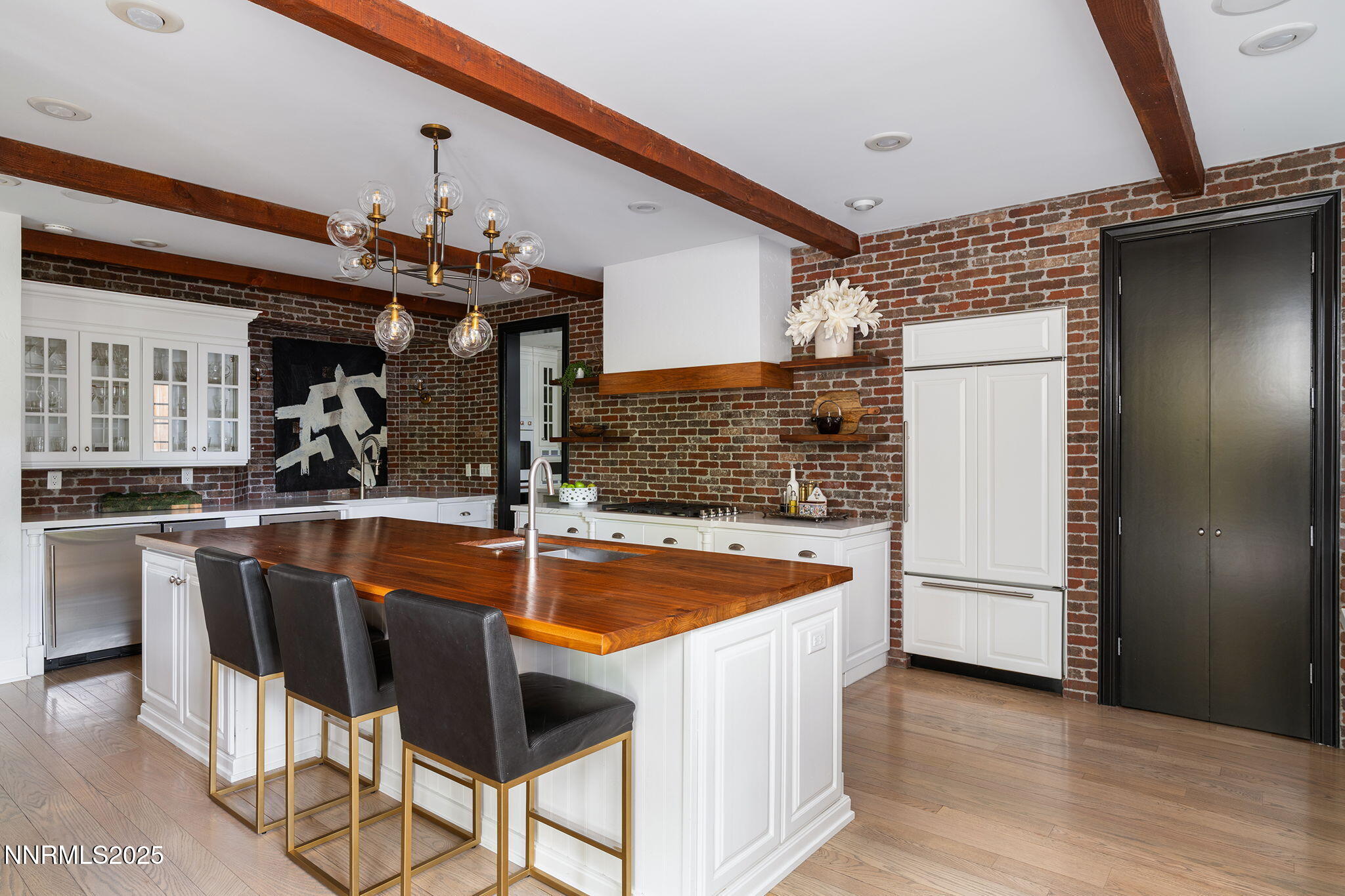 144 Greenridge Drive Reno, NV 89509 - Photo 23 of 71 a kitchen with stainless steel appliances granite countertop a sink and a refrigerator