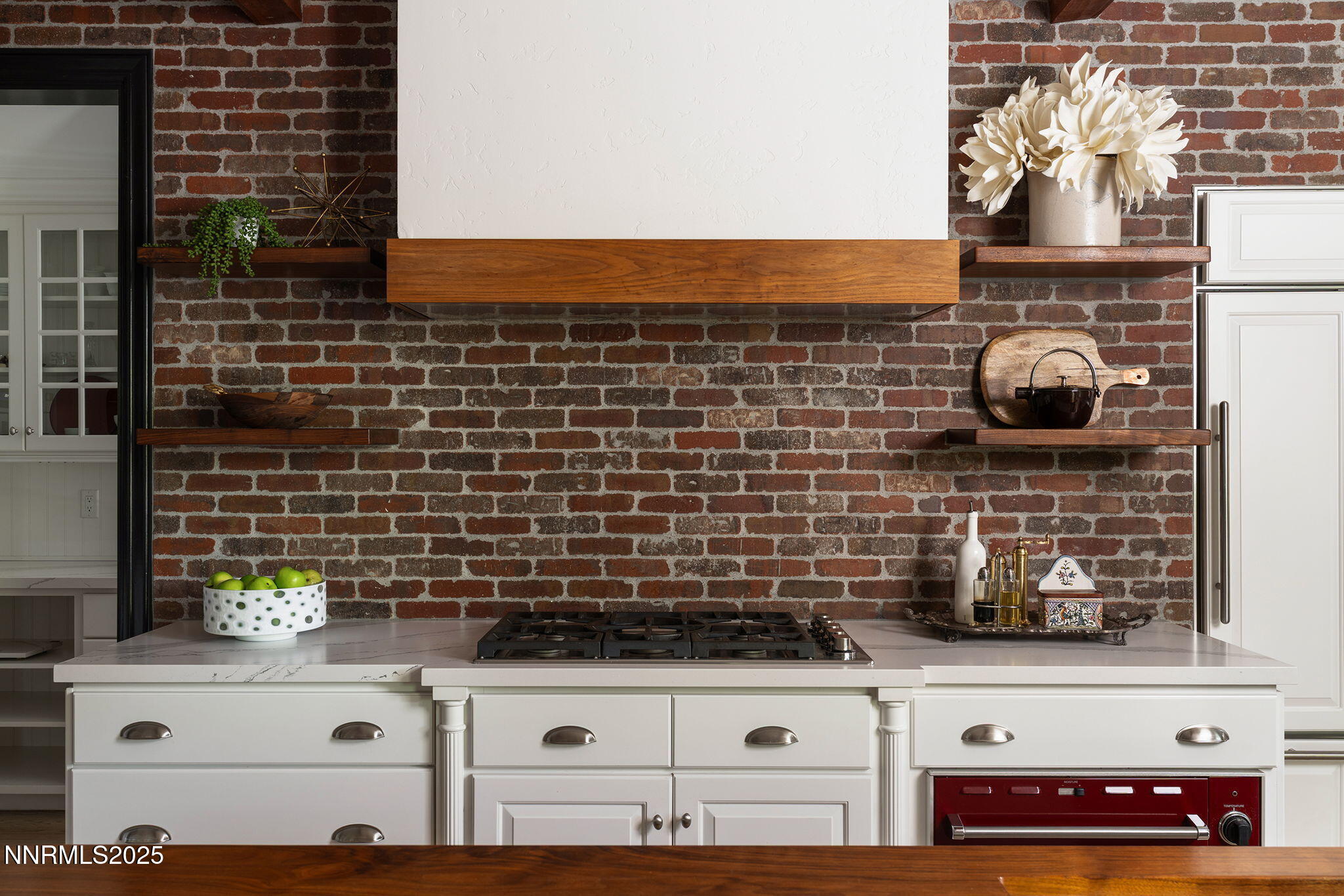 144 Greenridge Drive Reno, NV 89509 - Photo 25 of 71 closeup of a stove top oven sitting inside of a kitchen