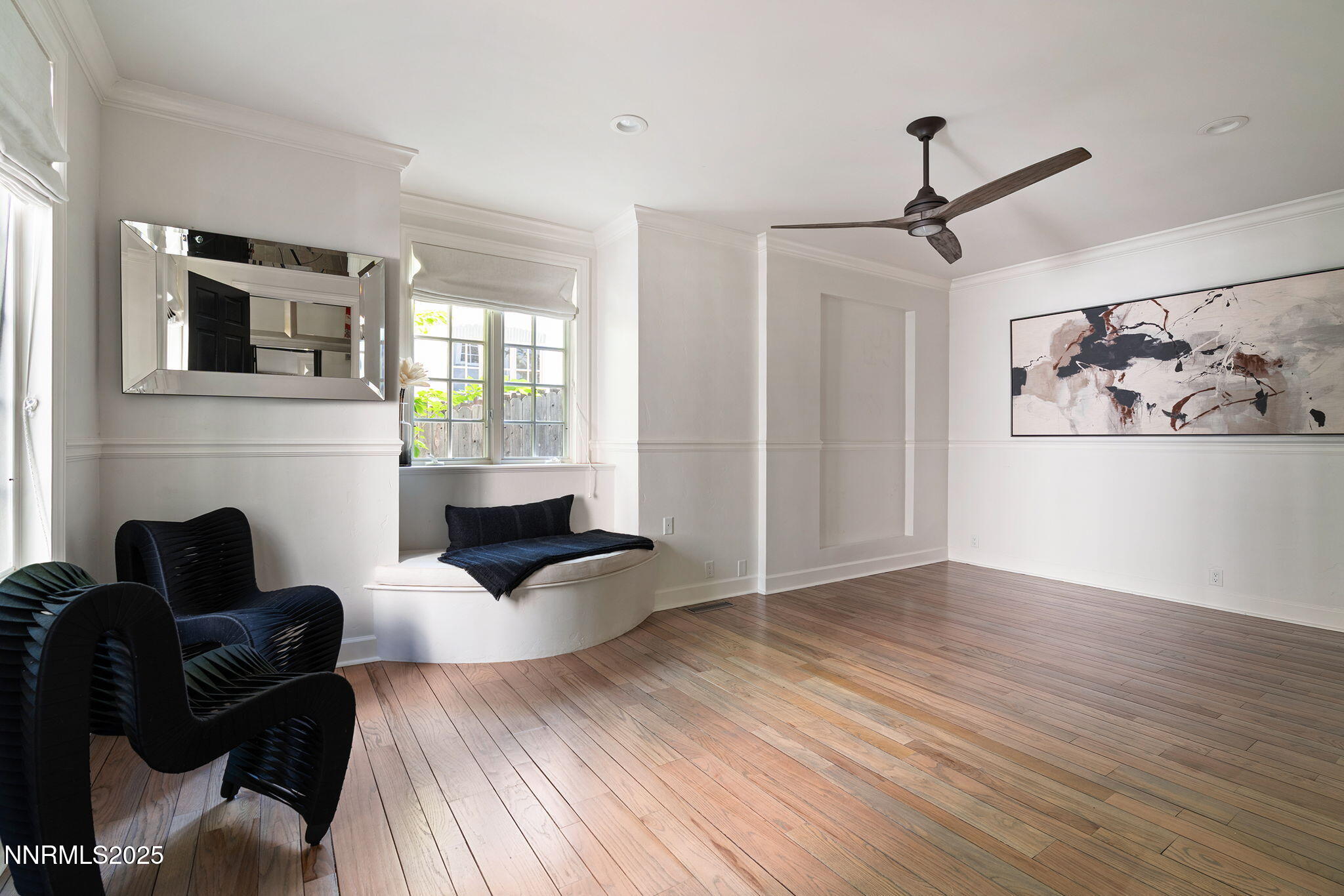 144 Greenridge Drive Reno, NV 89509 - Photo 36 of 71 a living room with furniture a fireplace and a flat screen tv