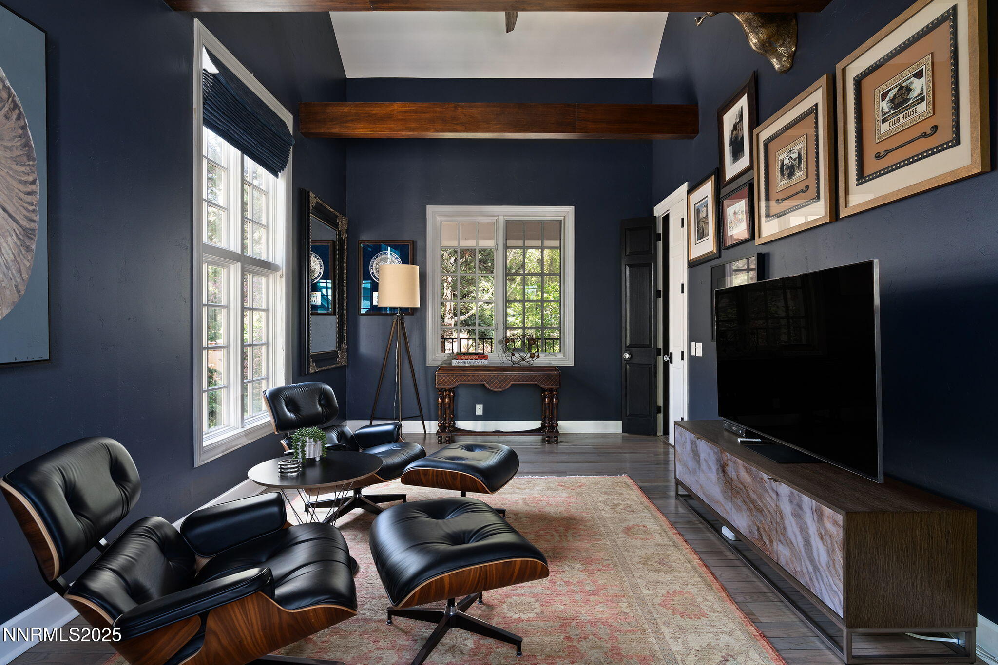 144 Greenridge Drive Reno, NV 89509 - Photo 41 of 71 a living room with furniture and a flat screen tv