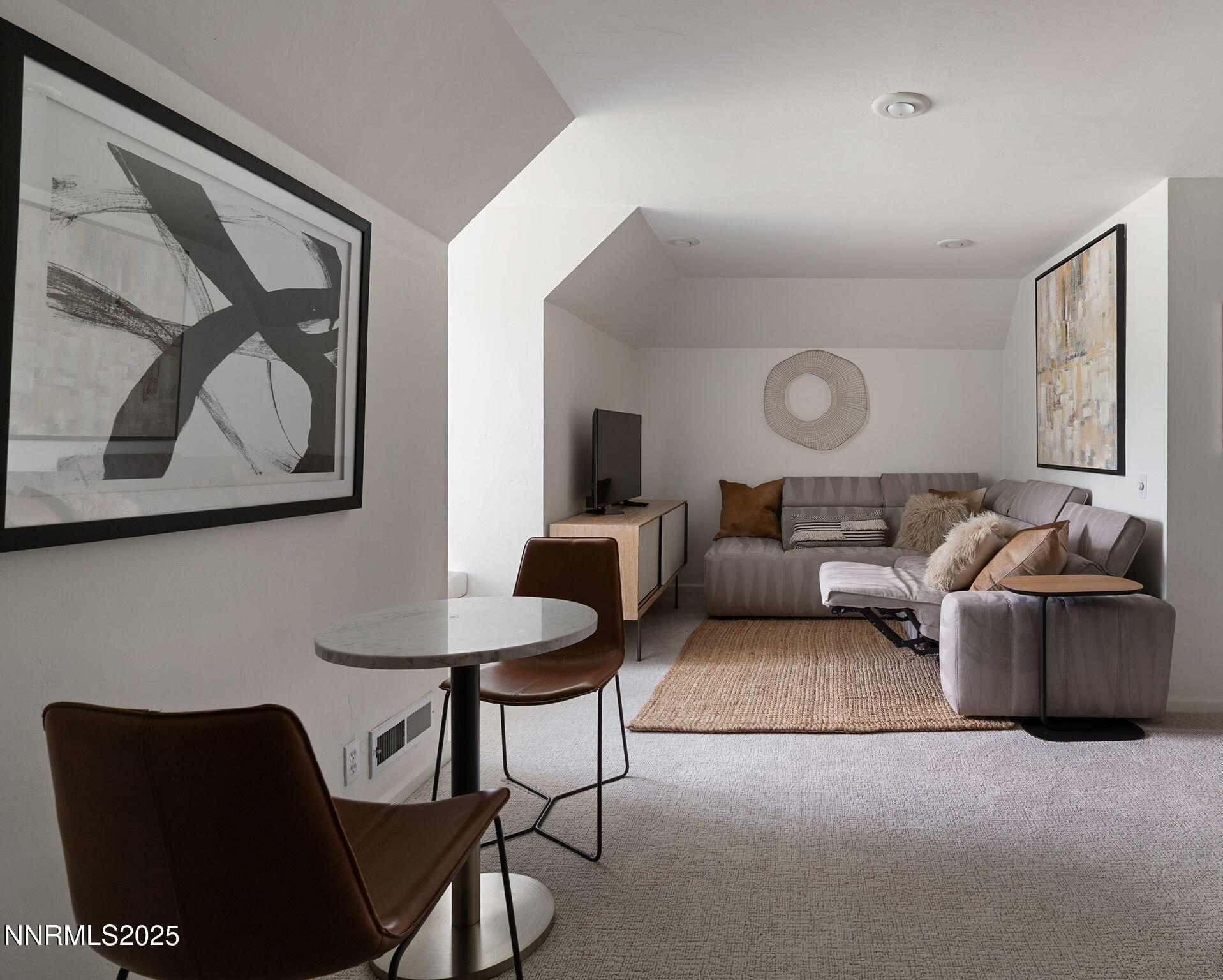 144 Greenridge Drive Reno, NV 89509 - Photo 43 of 71 a living room with furniture and a painting on the wall