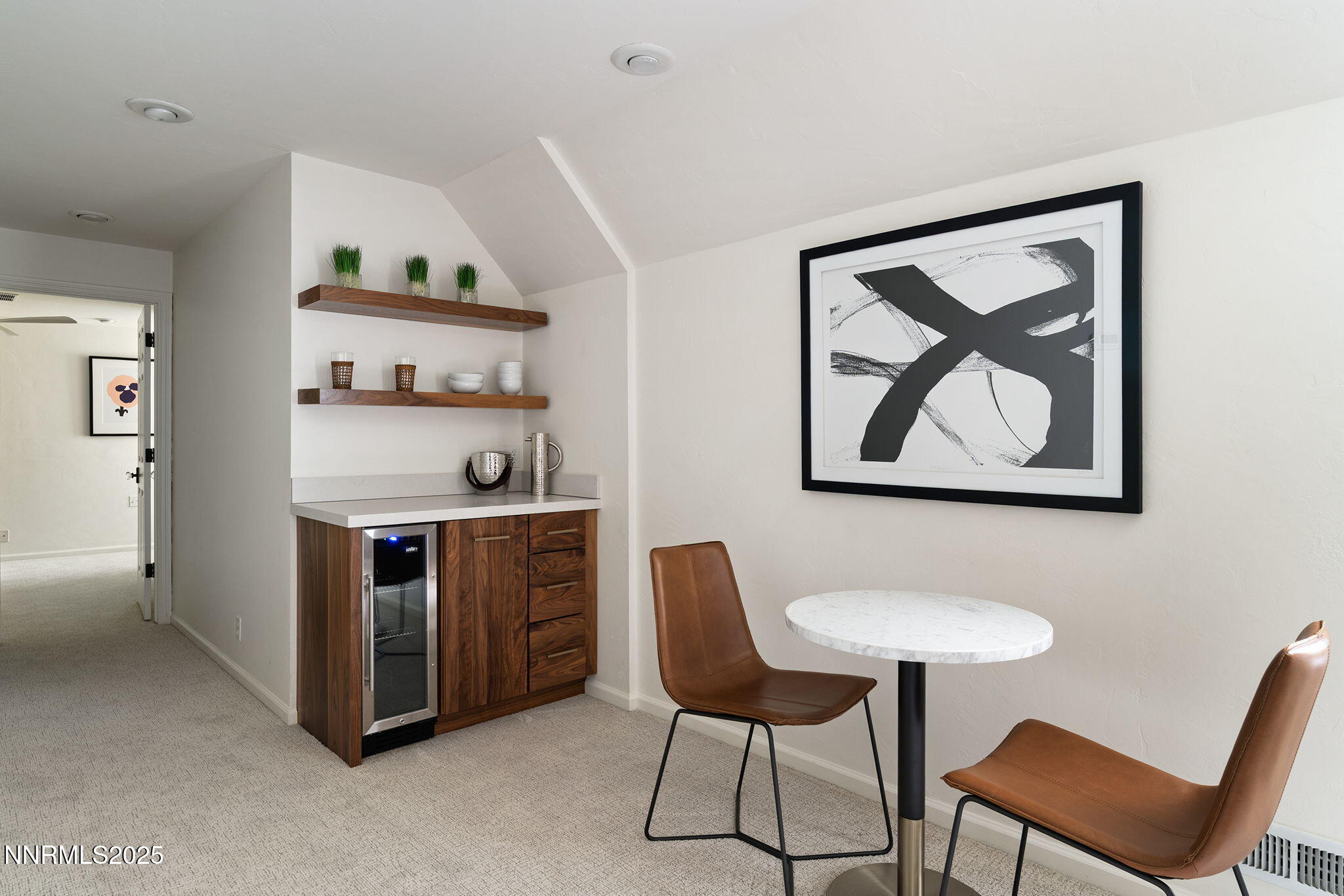 144 Greenridge Drive Reno, NV 89509 - Photo 44 of 71 a kitchen with stainless steel appliances a stove refrigerator and white cabinets