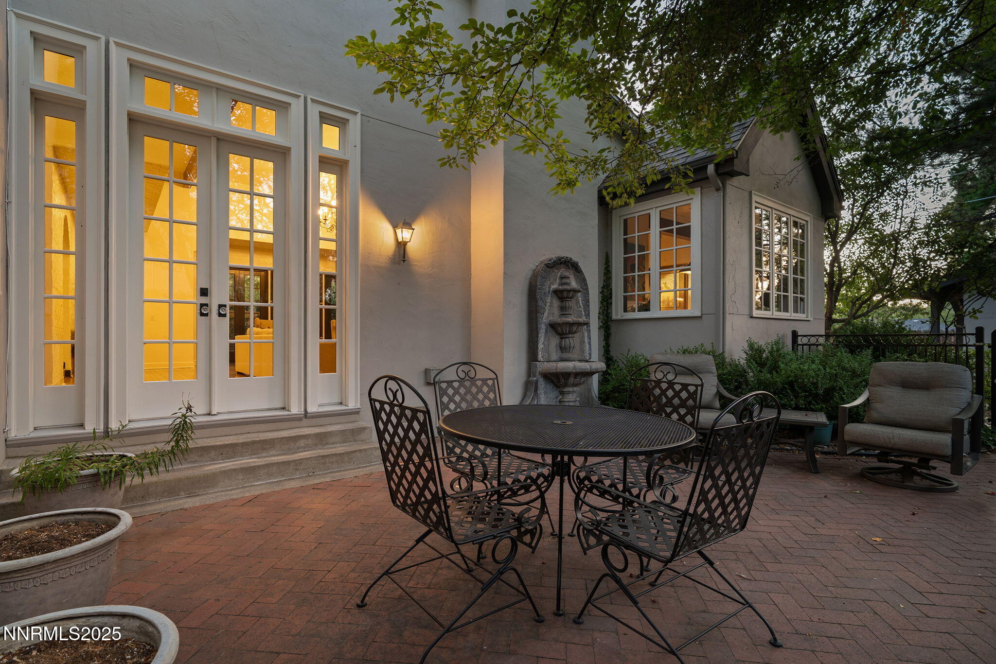 144 Greenridge Drive Reno, NV 89509 - Photo 52 of 71 a backyard of a house with table and chairs