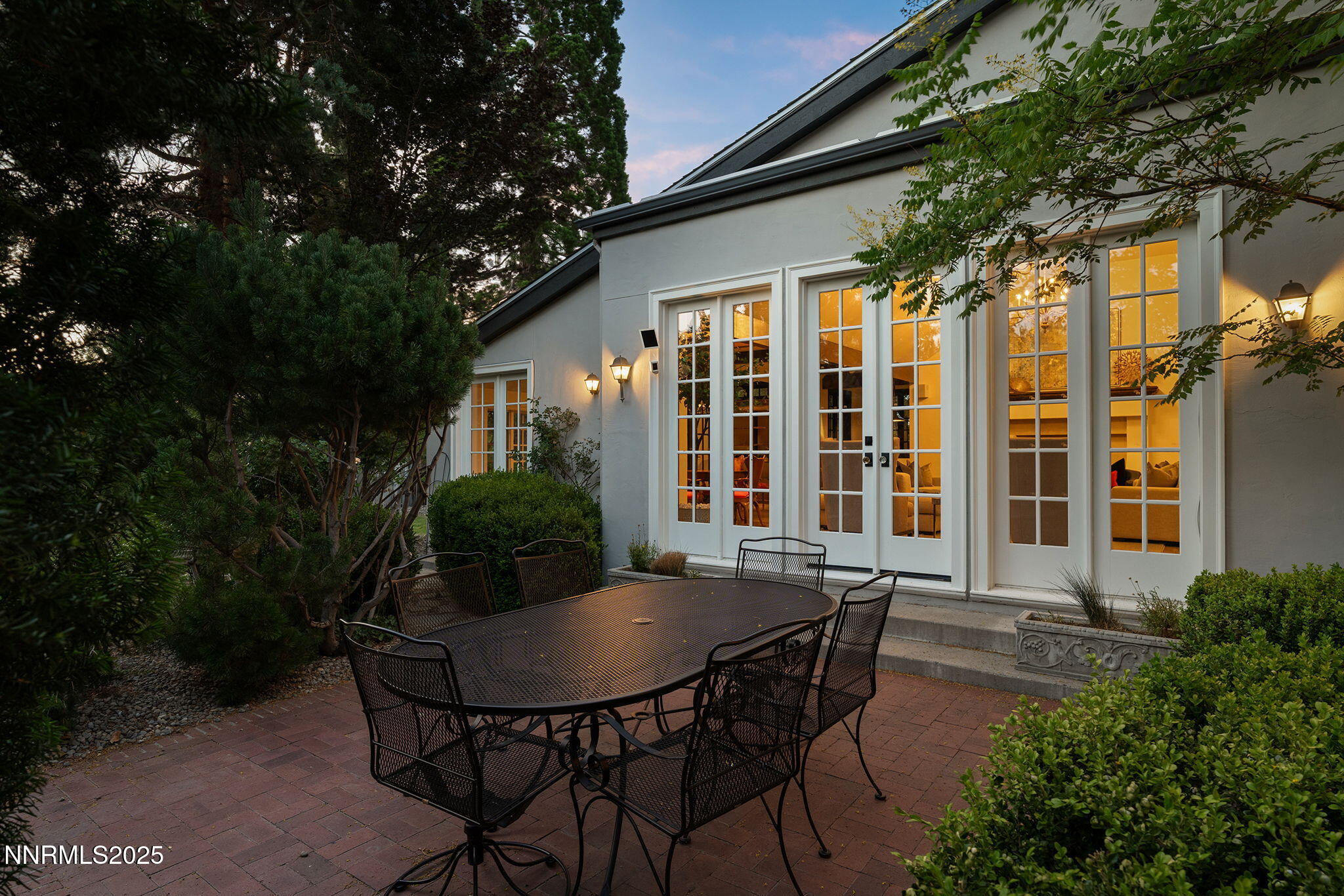 144 Greenridge Drive Reno, NV 89509 - Photo 59 of 71 a view of a patio with table and chairs and potted plants