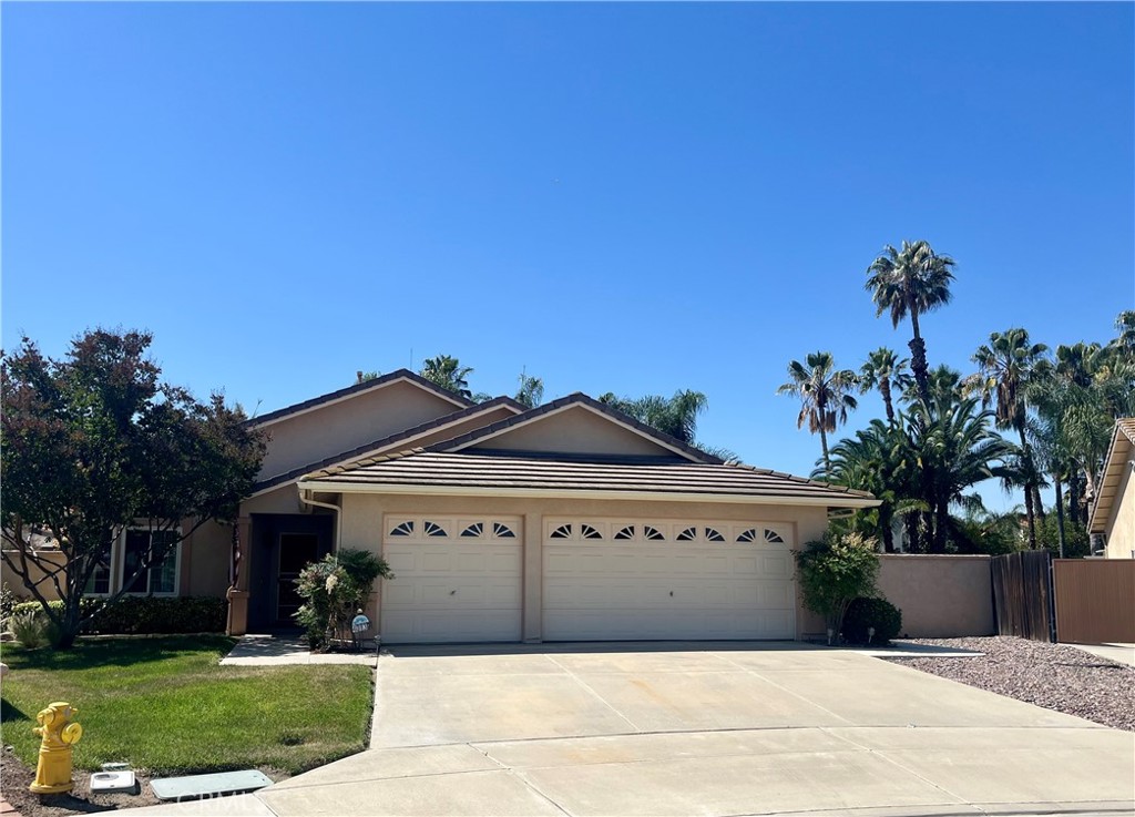 40139 Roshani Drive Temecula, CA 92591 - Photo 1 of 1 a view of a white house with a yard and potted plants