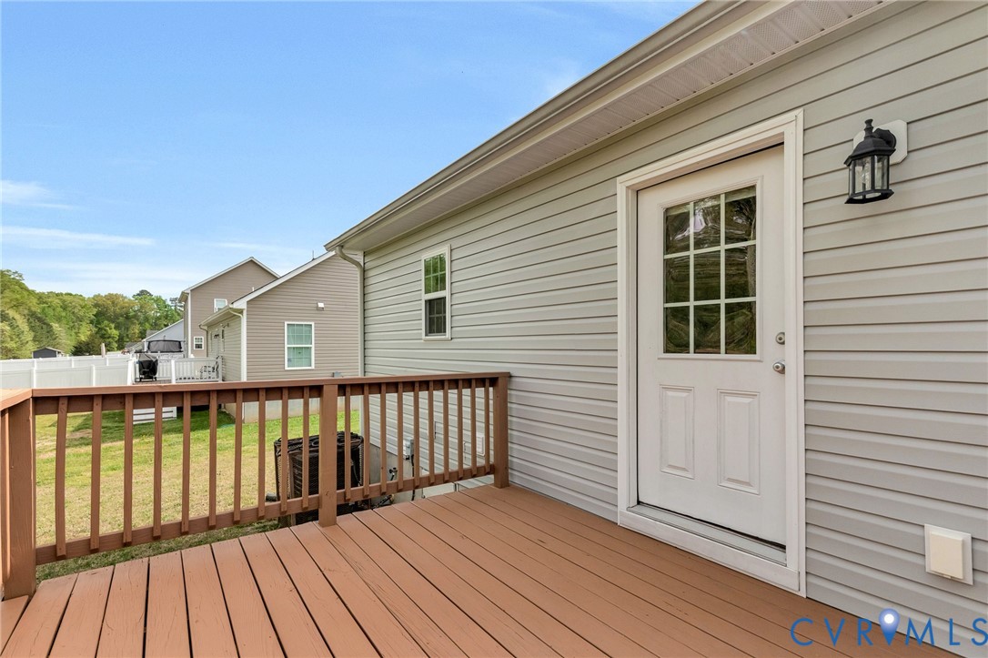 9925 Reymet Court Richmond, VA 23237 - Photo 26 of 30 a view of wooden deck