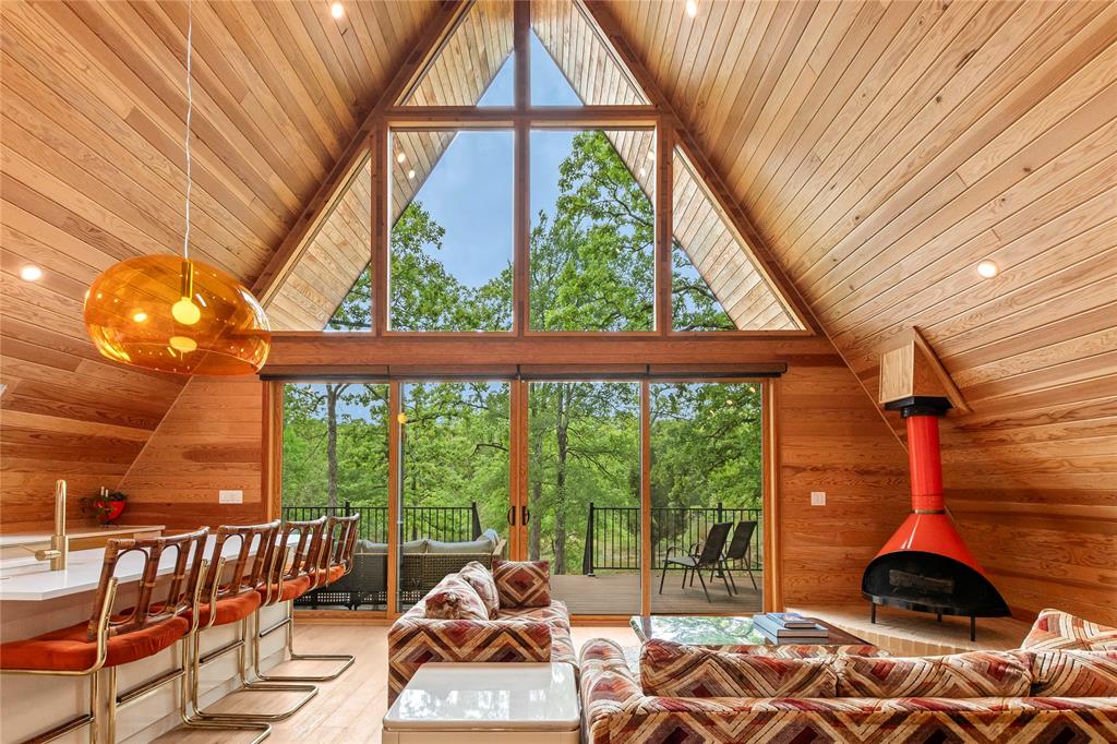 a living room with large windows