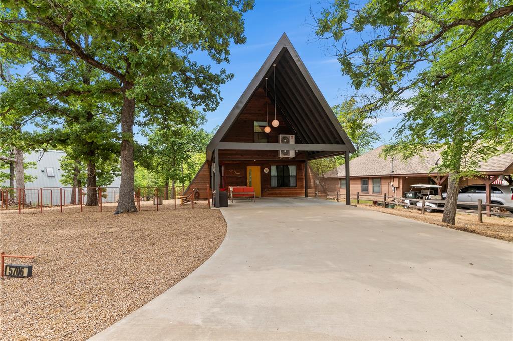 5706 Point La Vista Road Malakoff, TX 75148 - Photo 2 of 28 front view of a house with a street