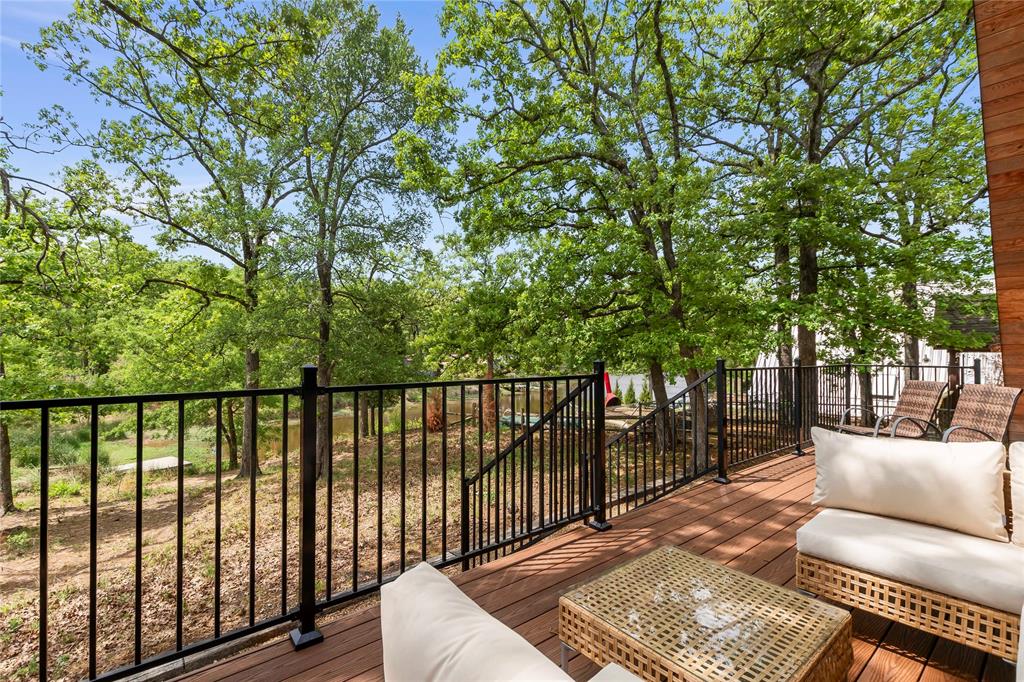 5706 Point La Vista Road Malakoff, TX 75148 - Photo 24 of 28 a balcony with wooden floor and outdoor seating