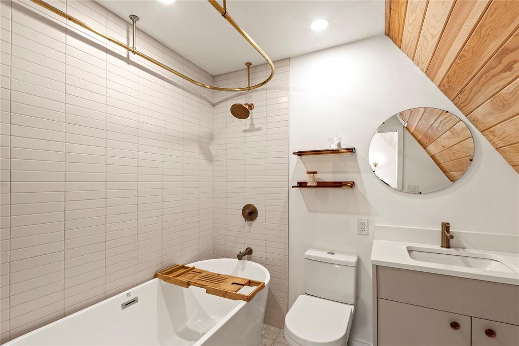 5706 Point La Vista Road Malakoff, TX 75148 - Photo 9 of 28 a bathroom with a sink toilet and shower