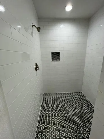 a bathroom with a toilet sink and bathtub
