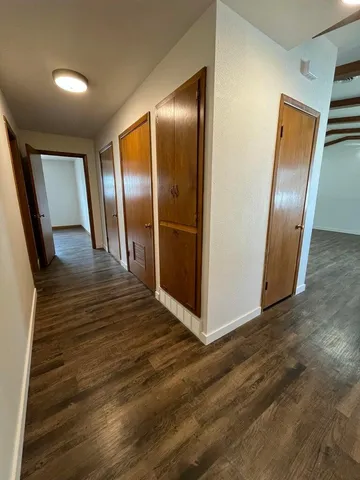 a house with trees in front of it