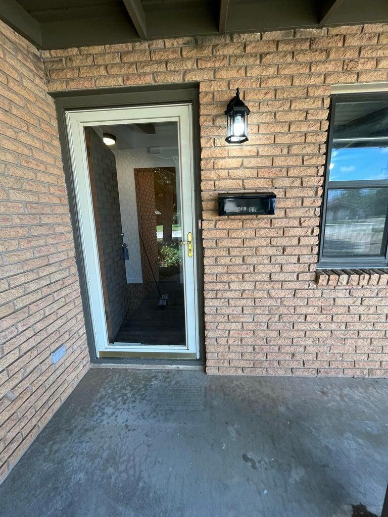 1307 Garland Plainview, TX 79072 - Photo 2 of 23 a view of a entryway door of the building