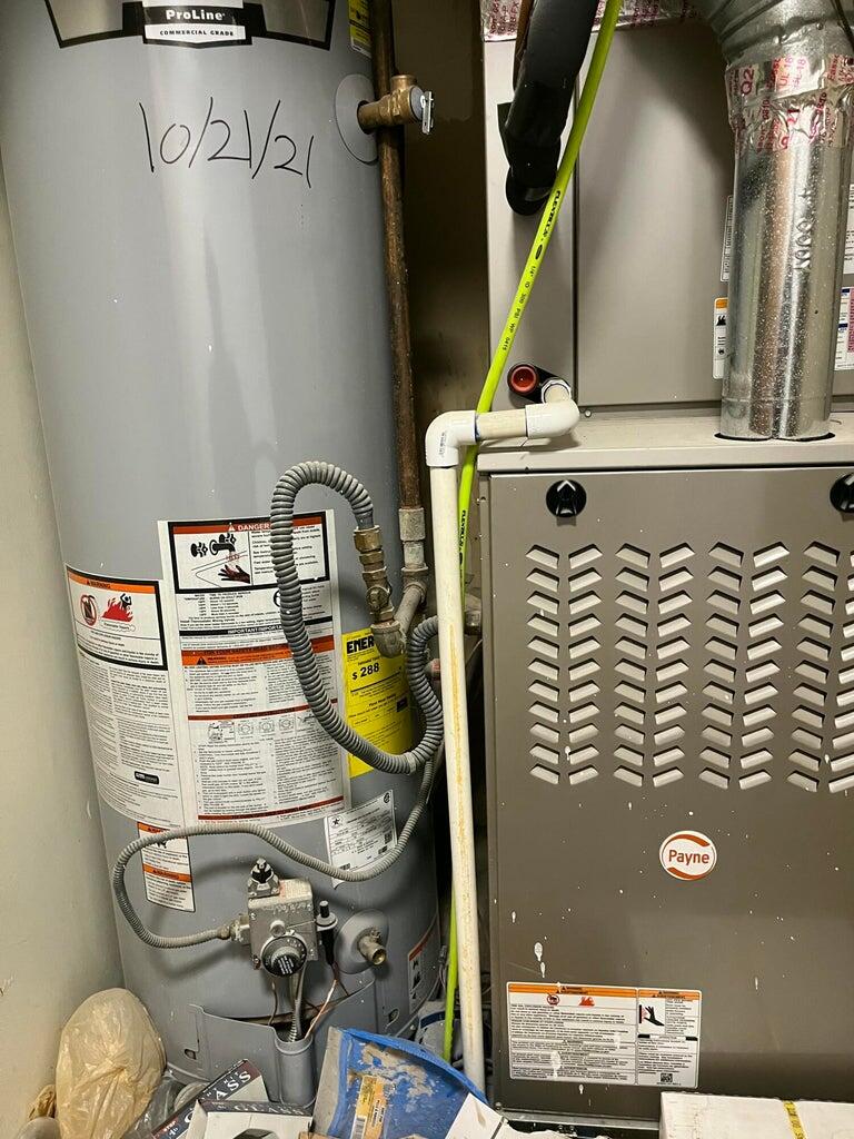 1307 Garland Plainview, TX 79072 - Photo 22 of 23 a utility room with dryer and washer