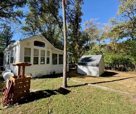a front view of a house with yard