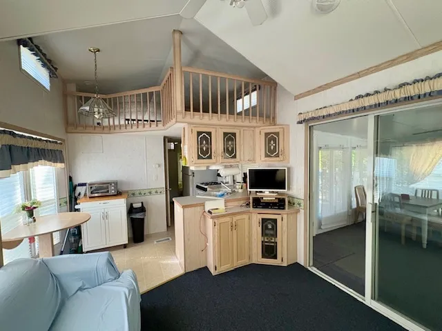 a kitchen with stainless steel appliances granite countertop a stove and a refrigerator
