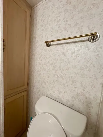 a bathroom with a sink a mirror and a shower