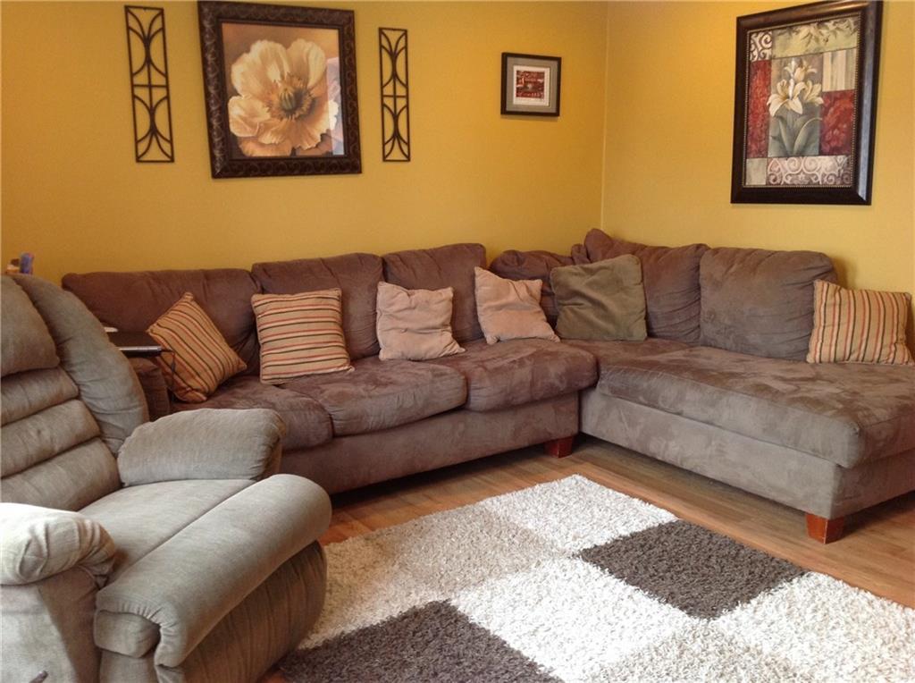7 Benjamin Lane Morrill, ME 04952 - Photo 14 of 20 Sunny and bright living room.