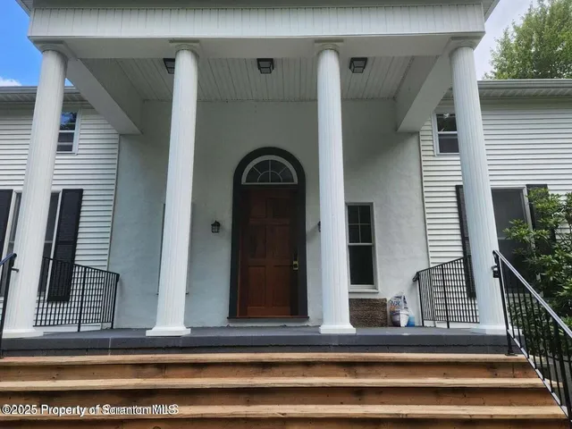 a view of a staircase door of the house