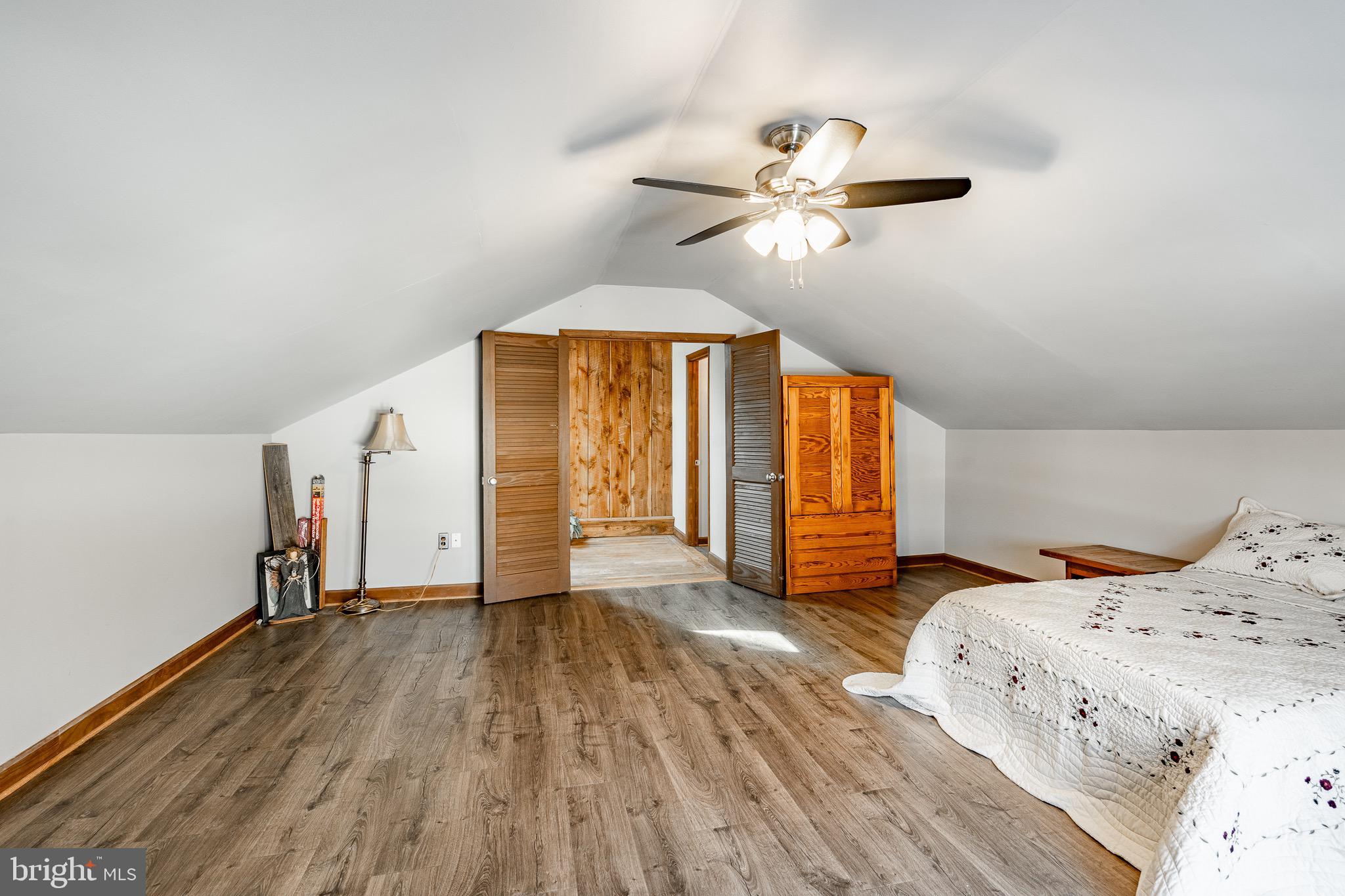 121 West Boot Road West Chester, PA 19380 - Photo 19 of 38 a bedroom with a bed and wooden floor