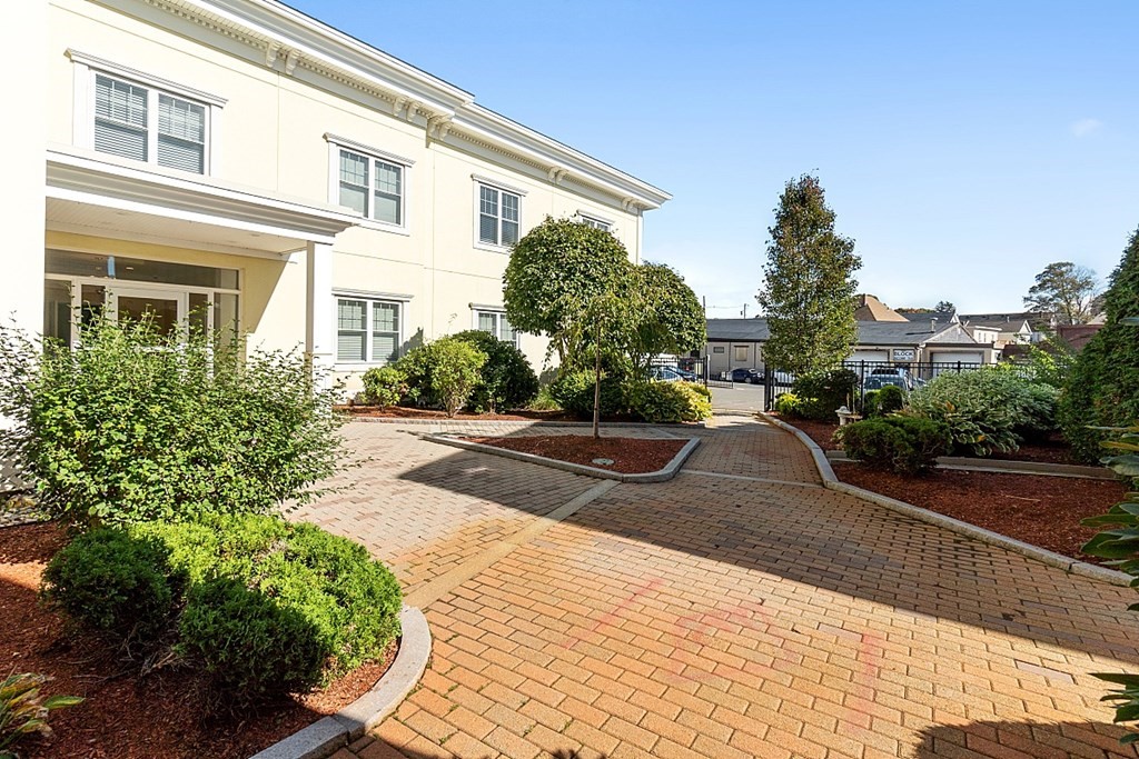 426 Main Street, Unit 205 Melrose, MA 02176 - Photo 22 of 26 a view of a house with a street