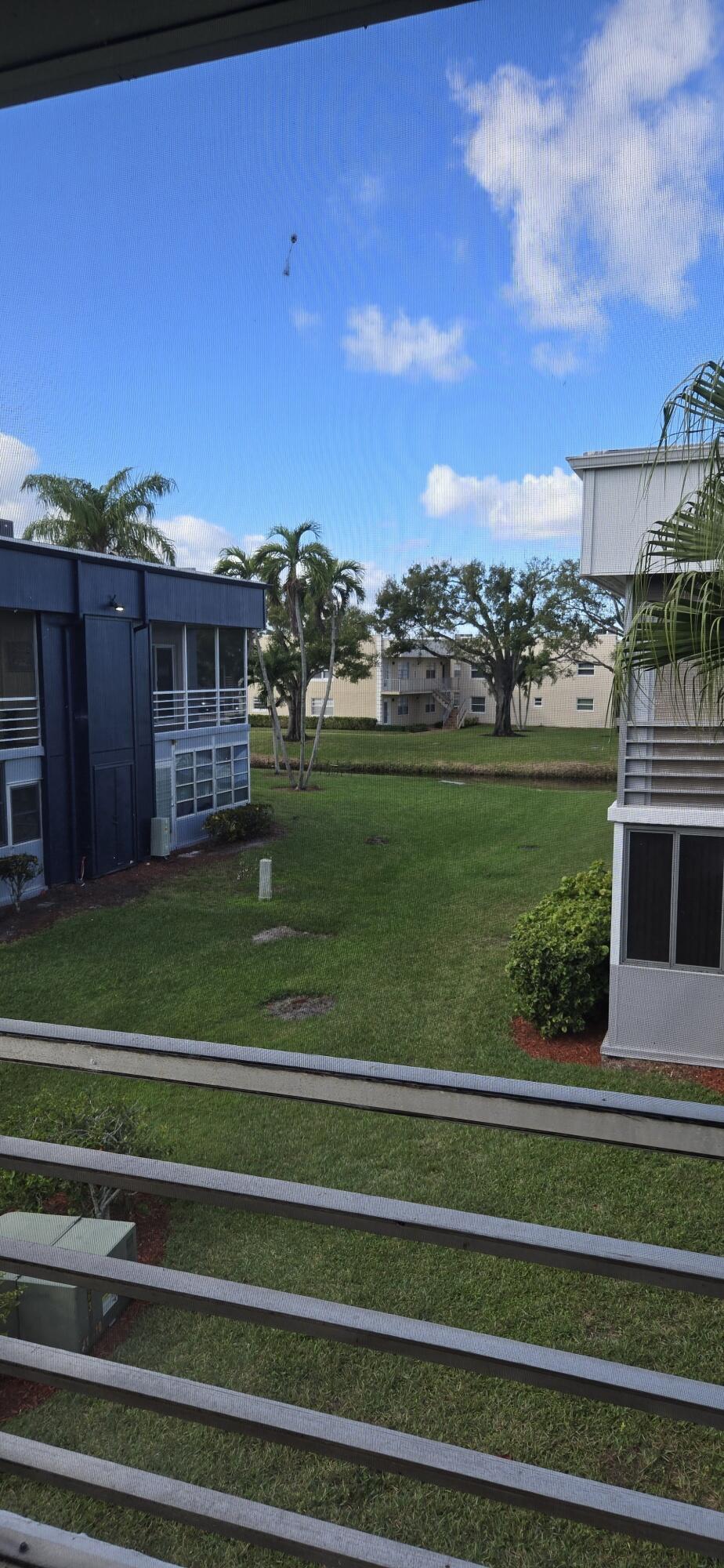 186 Burgandy Way Delray Beach, FL 33484 - Photo 18 of 26 a view of a house with a big yard