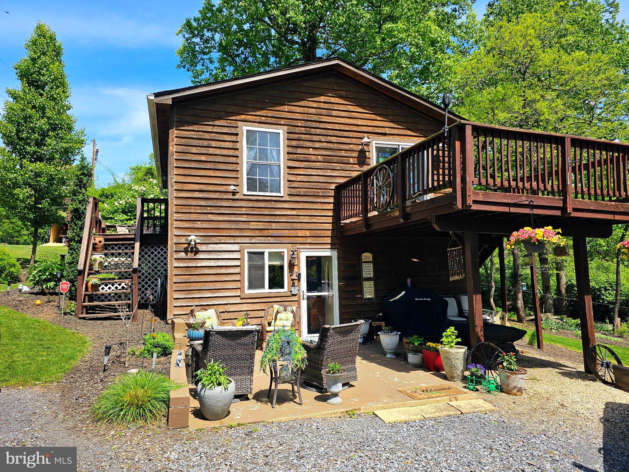 Charming wooden retreat with lush greenery.