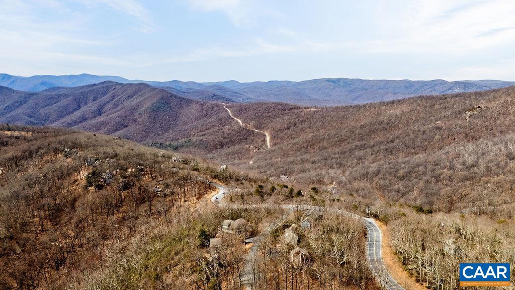 107 Chestnut Lane Roseland, VA 22967 - Photo 13 of 42 a view of a lush green field with mountains in the background
