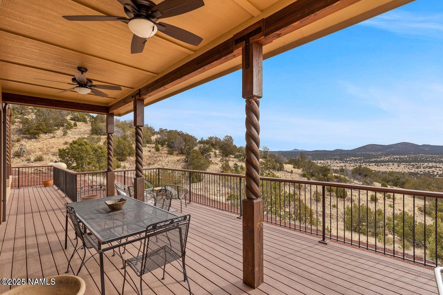 1843 East Sagebrush Road Williams, AZ 86046 - Photo 13 of 31 a view of a city from a balcony with seating space