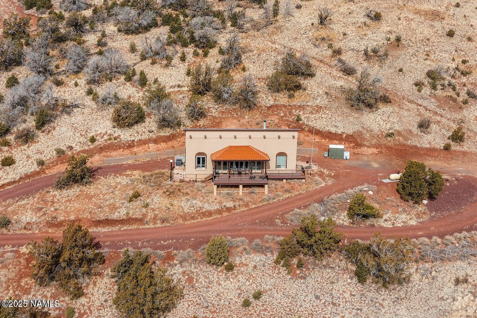 1843 East Sagebrush Road Williams, AZ 86046 - Photo 15 of 31 a view of a pathway with a yard