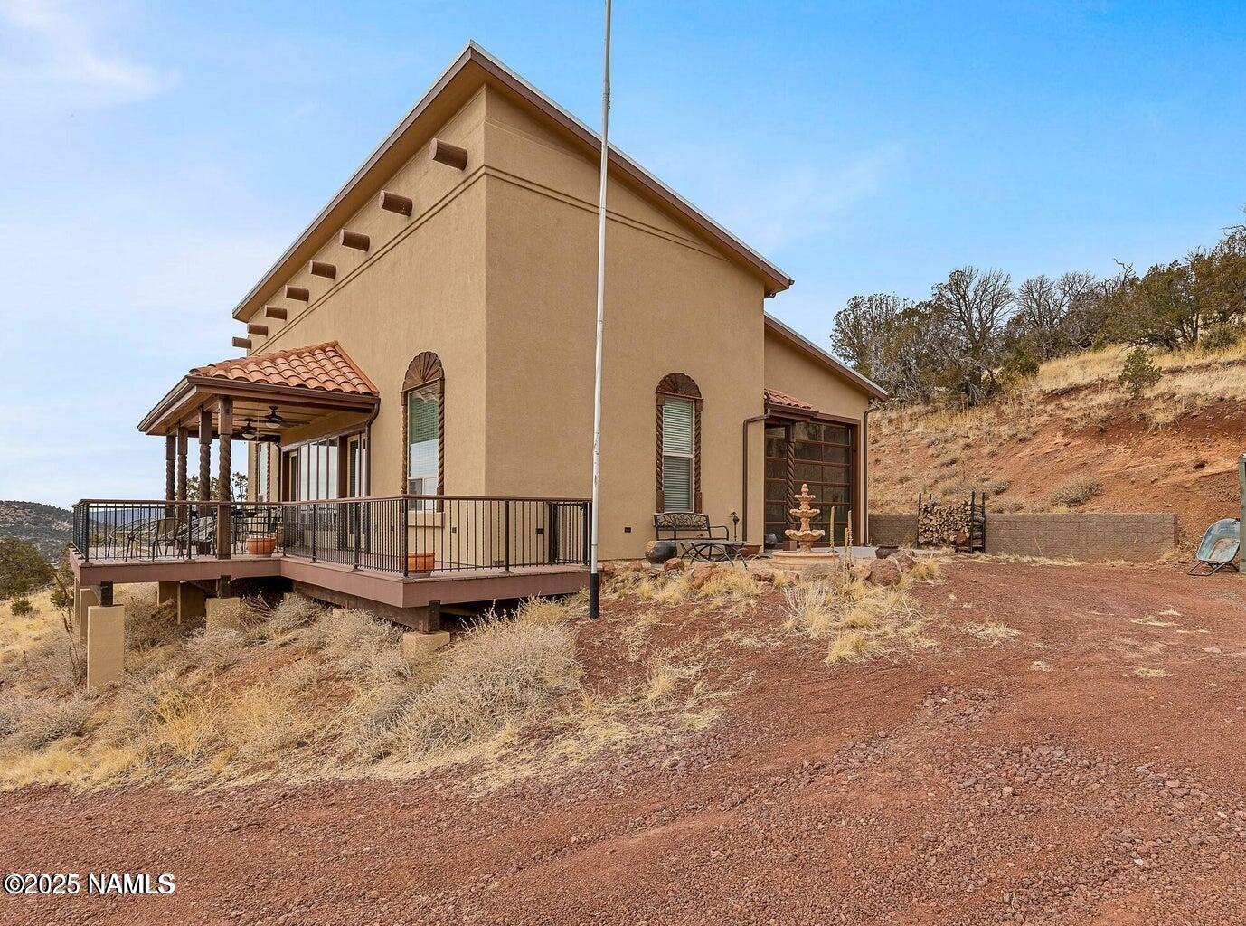 1843 East Sagebrush Road Williams, AZ 86046 - Photo 20 of 31 a view of a house with wooden fence