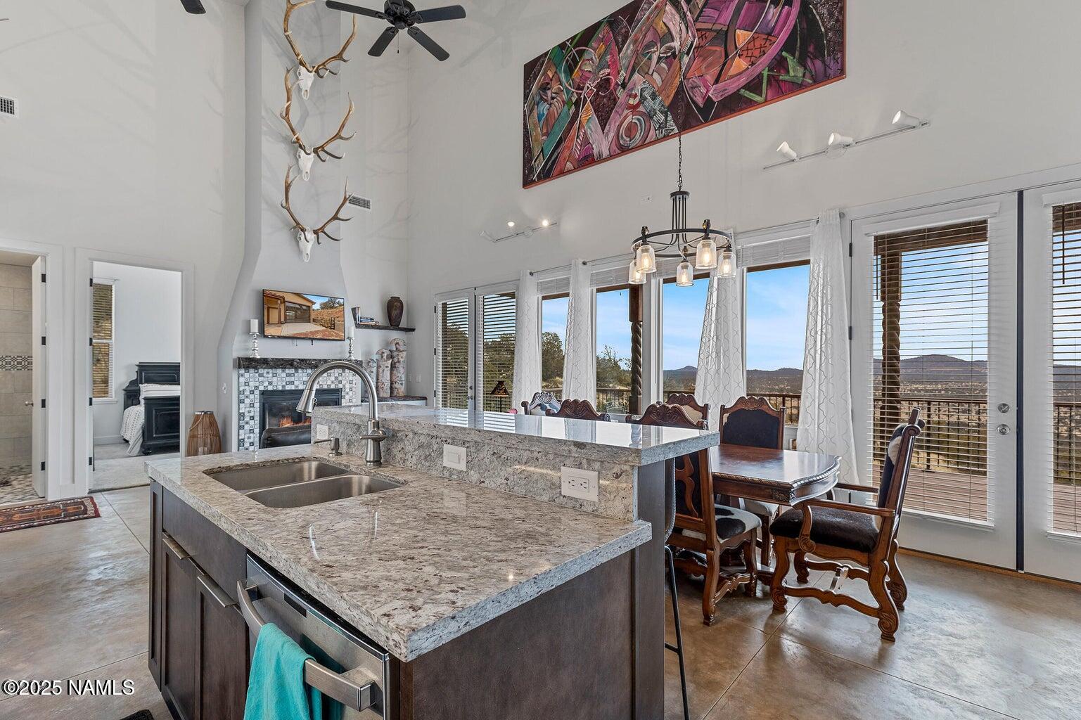 1843 East Sagebrush Road Williams, AZ 86046 - Photo 5 of 31 a view of a dining room with furniture window and outside view