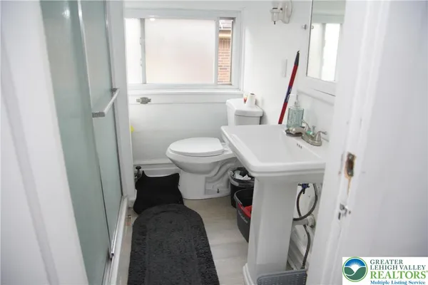 a bathroom with a sink and a toilet
