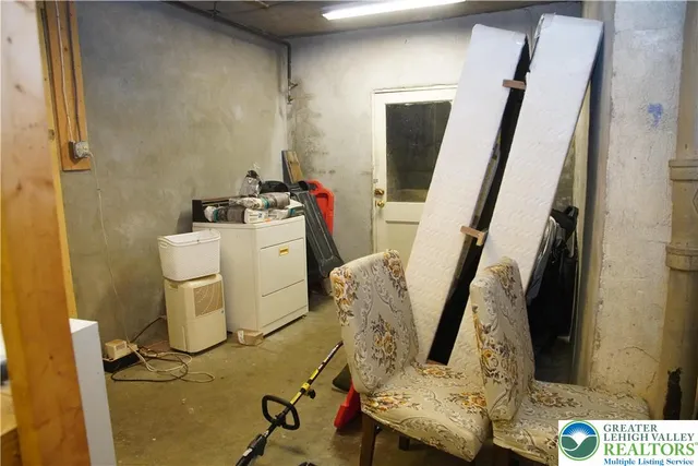 a kitchen with stainless steel appliances a refrigerator and a stove