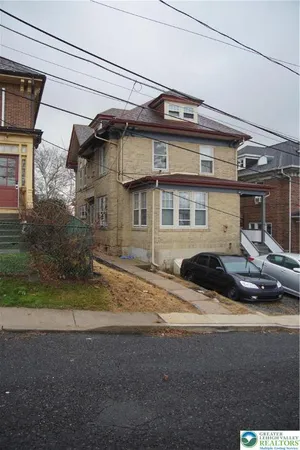 a view of a house with a patio