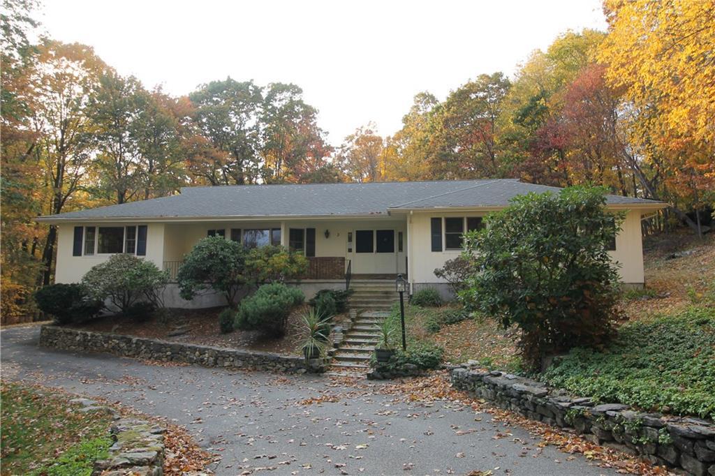 3 Old Wagon Road Ridgefield, CT 06877 - Photo 1 of 1 a front view of a house with garden and porch
