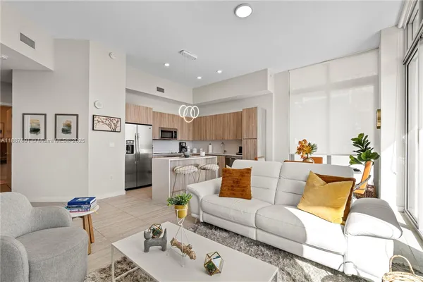 a living room with furniture and a couch