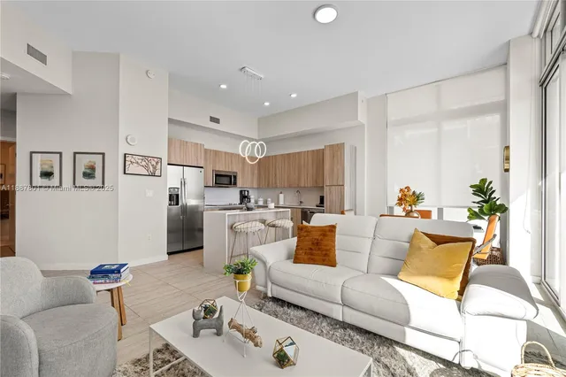 a living room with furniture and a couch