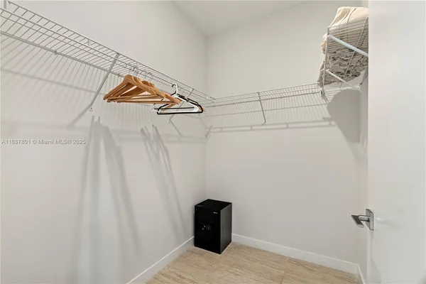 a view of a walk in closet