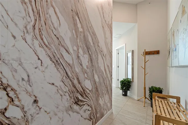 a view of a room with wooden floor and chair