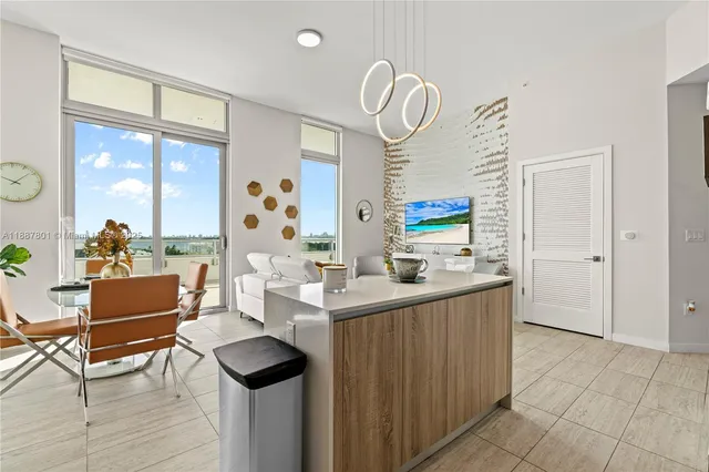 a living room with granite countertop furniture and a window