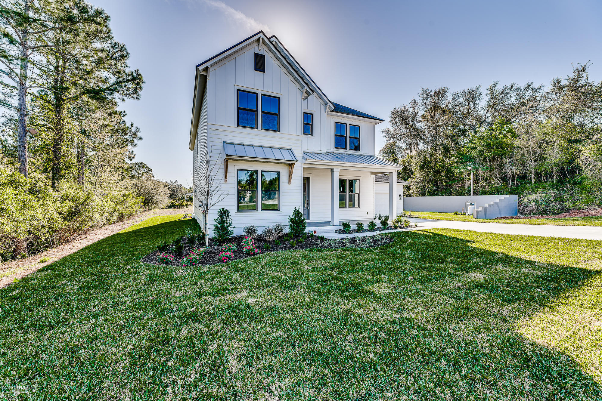 12507 Hidden Drive Jacksonville, FL 32225 - Photo 2 of 66 a front view of a house with a yard
